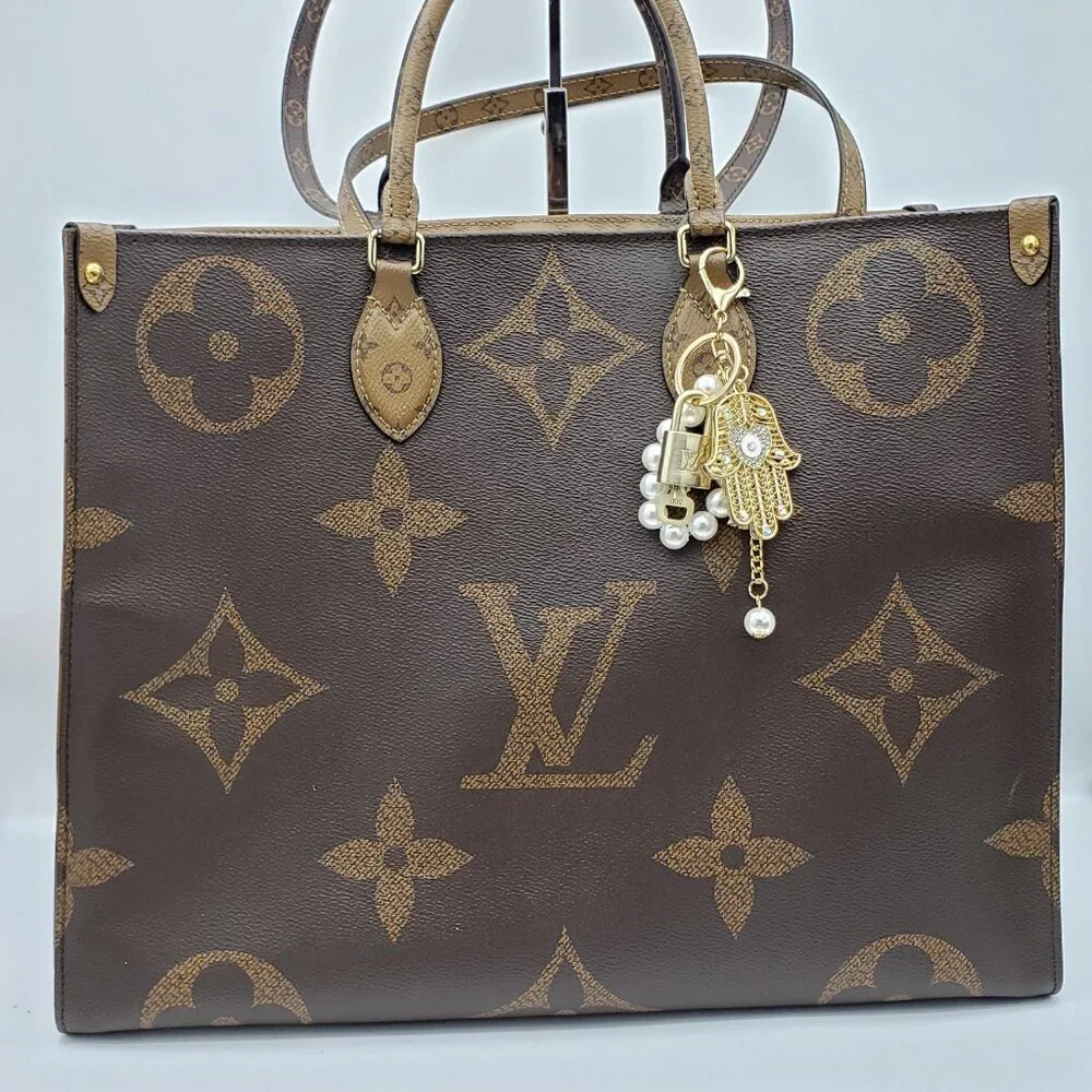 Louis Vuitton Gold Lock 🔒 Authentic LV Key + Unbranded Evil Eye Bag Charm